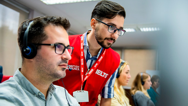 Man answering IELTS General Reading module