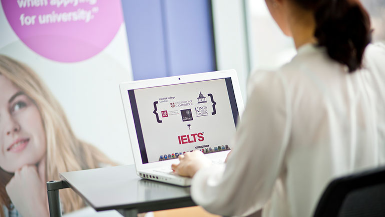 A woman studying for the IELTS