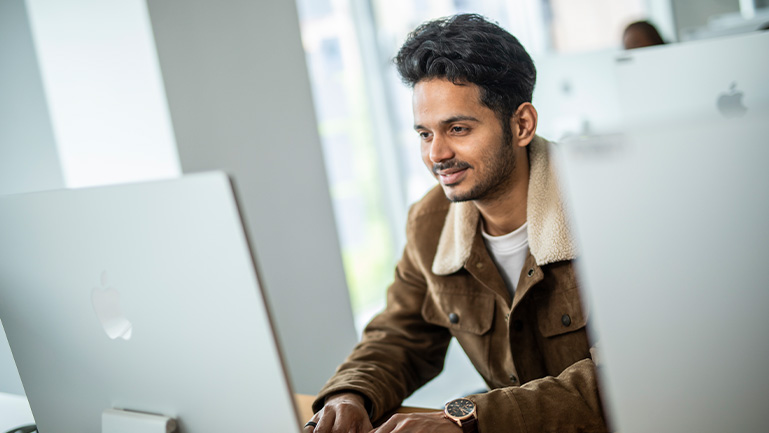 A man taking an online exam.