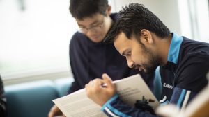 Two men prepare for IELTS One Skill Retake